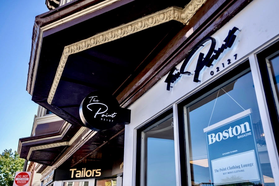 The Point Clothing Lounge storefront on Emerson Street, South Boston, featuring the Boston Magazine Best Men's Clothing Store award displayed in the window